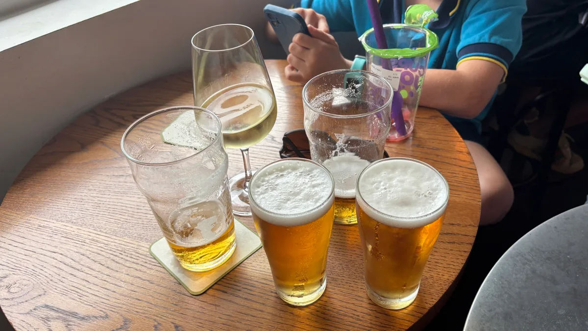 Kristof is 🍺 drinking at Railway Hotel with Raphael and Nada.