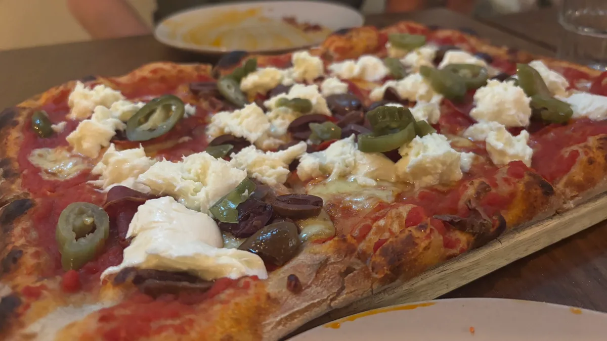 Kristof is 🍕 eating pizza at 3 GRAINS Pizza Yarraville.
