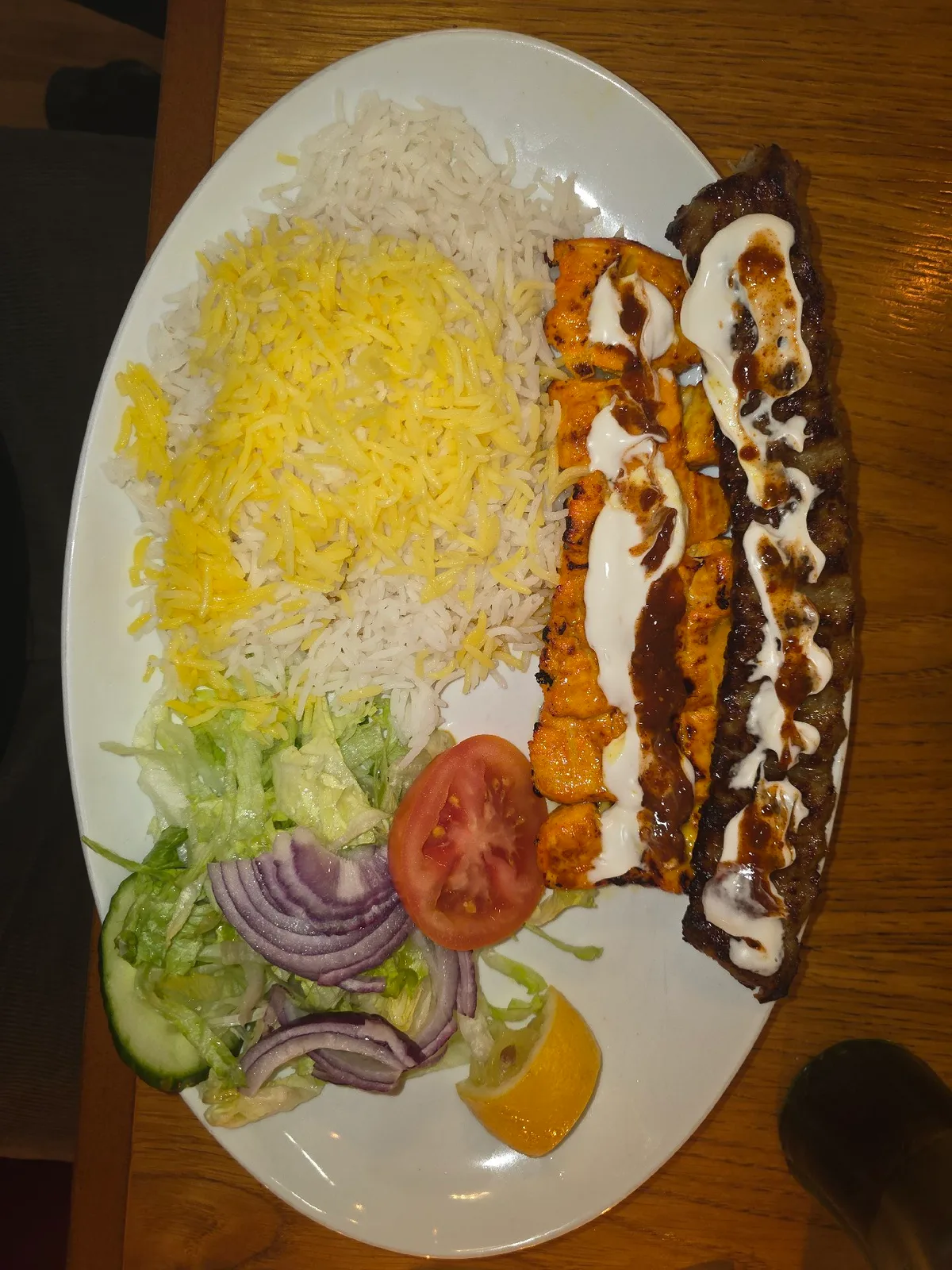 Brad Smith is at Rice Persian Kitchen.