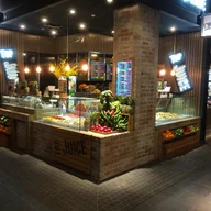 Top Juice East Village logo