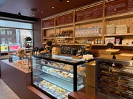 Wholegreen Bakery & Cafe Manly logo