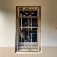 The Shop & Wine Bar logo