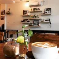 Maimalu Coffee House logo