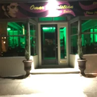 Omar and Cristian Hair Salon logo
