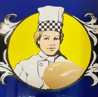 Trianon Bread and Cake Works logo