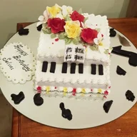 Erosha's Cakes and Sugar Flowers logo