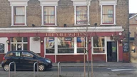 The Village Inn logo