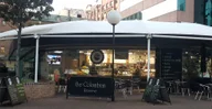 Delish Tran Cafe logo