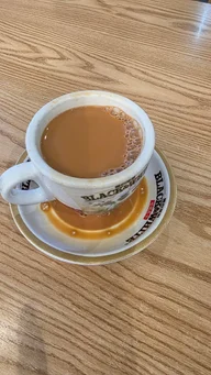 The Lucky Guys Cafe logo