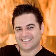 Dr John Michalopoulos Dental logo