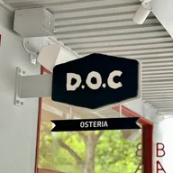 D.O.C Osteria, Carlton logo