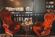Ampersand Cafe and Bookstore logo