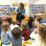 Millie's House Nursery and Pre-School logo