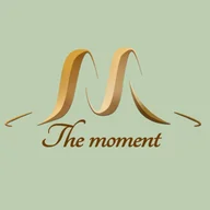 The moment restaurant logo