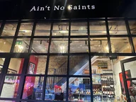 Aint No Saints Cafe Bar logo