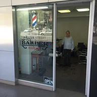 The William Street Barber logo