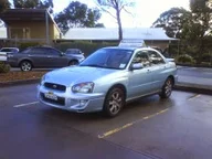 Tashman Driving School logo
