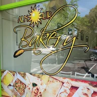 Alnour Bakery logo