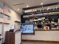 Jin and Co Daily Grind logo