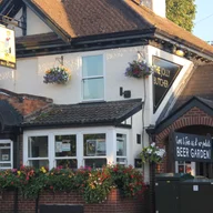 The Jolly Butcher logo