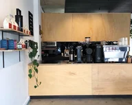 Migrant Coffee logo