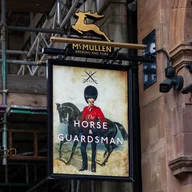 Horse and Guardsman logo