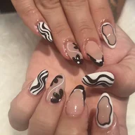 Cozy Nails and Beauty spa logo