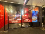 Indulge Waffles and Desserts St Kilda logo