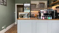Small caps coffee logo