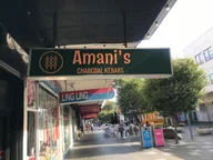 Amani's Charcoal Kebabs logo