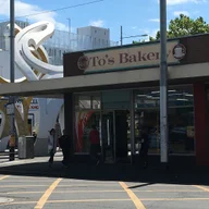 To's Bakery and Cafe logo