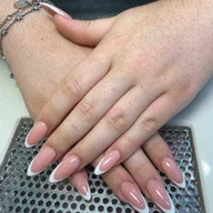 Nicole's Nail & Beauty logo