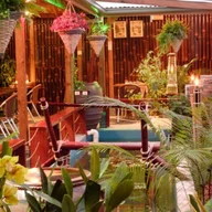 Blue Bamboo Restaurant and Cafe logo