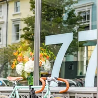 77 Hair Salon logo