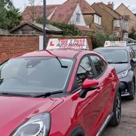 Aneka Driving School logo