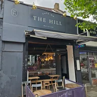 Cafe On The Hill logo