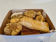 Al Nada Sweets logo