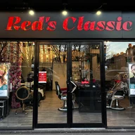 Red's Classic Salon and Barbershop logo
