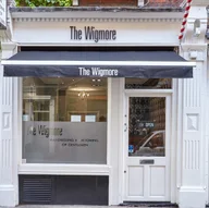 The Wigmore Barbers and Grooming Salon logo