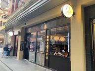 Onigiri Kitchen and Sake Bar logo
