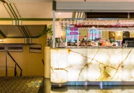 The Ritz Bar logo