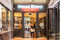 Natural History Bar & Grill logo