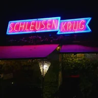 Schleusenkrug logo