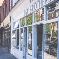 Jusu Brothers - Notting Hill logo