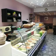 Asmarino Cafe logo