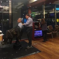 Ahmet's Barber and Hair Styling logo