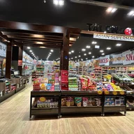 S-Mart International Grocery Store logo