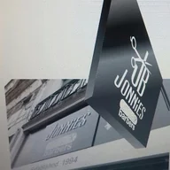 Jonnies Barbers and Hairdressers logo