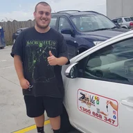 Sam Vic Driving School logo