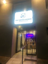 The Tibetan momos Nepalese restaurant logo